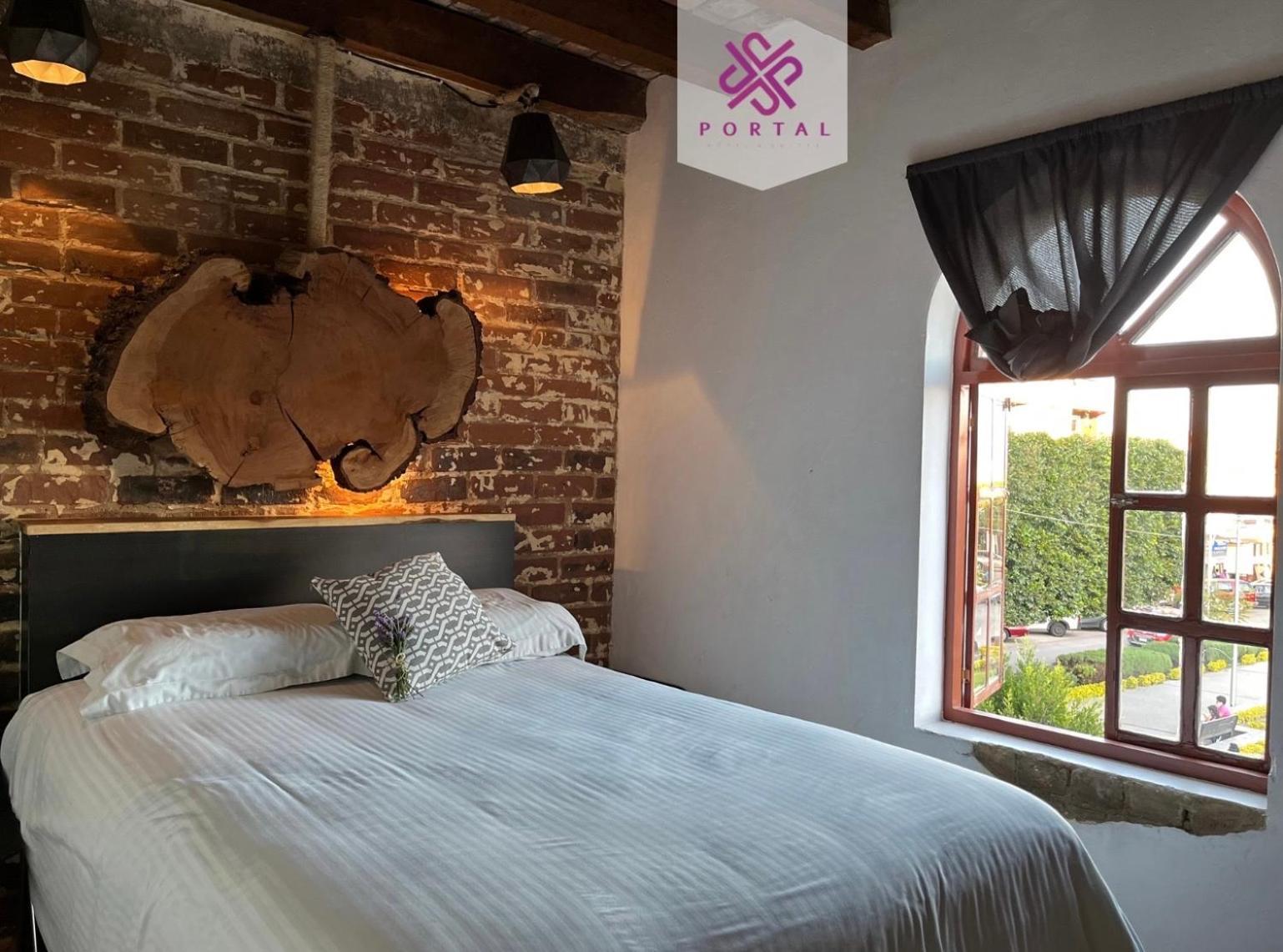 Hotel Portal & Suites Ciudad Hidalgo Bagian luar foto